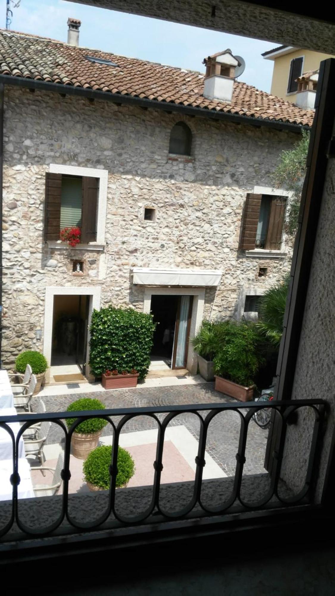Corte San Luca Apartments Bardolino Værelse billede